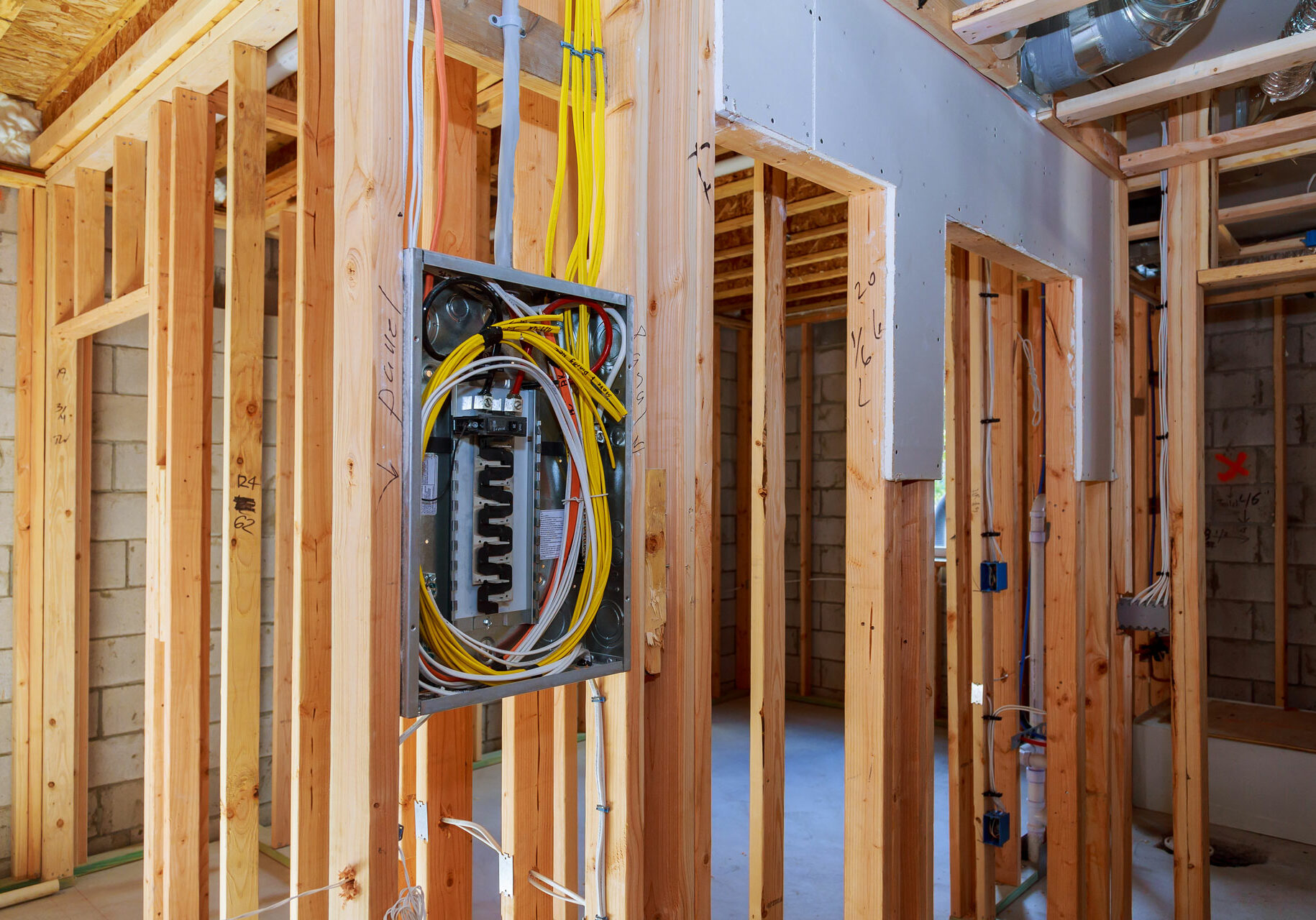 Framed wall with electric box and wires